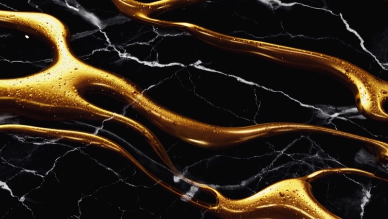 Flagship motion tier — liquid gold on black marble